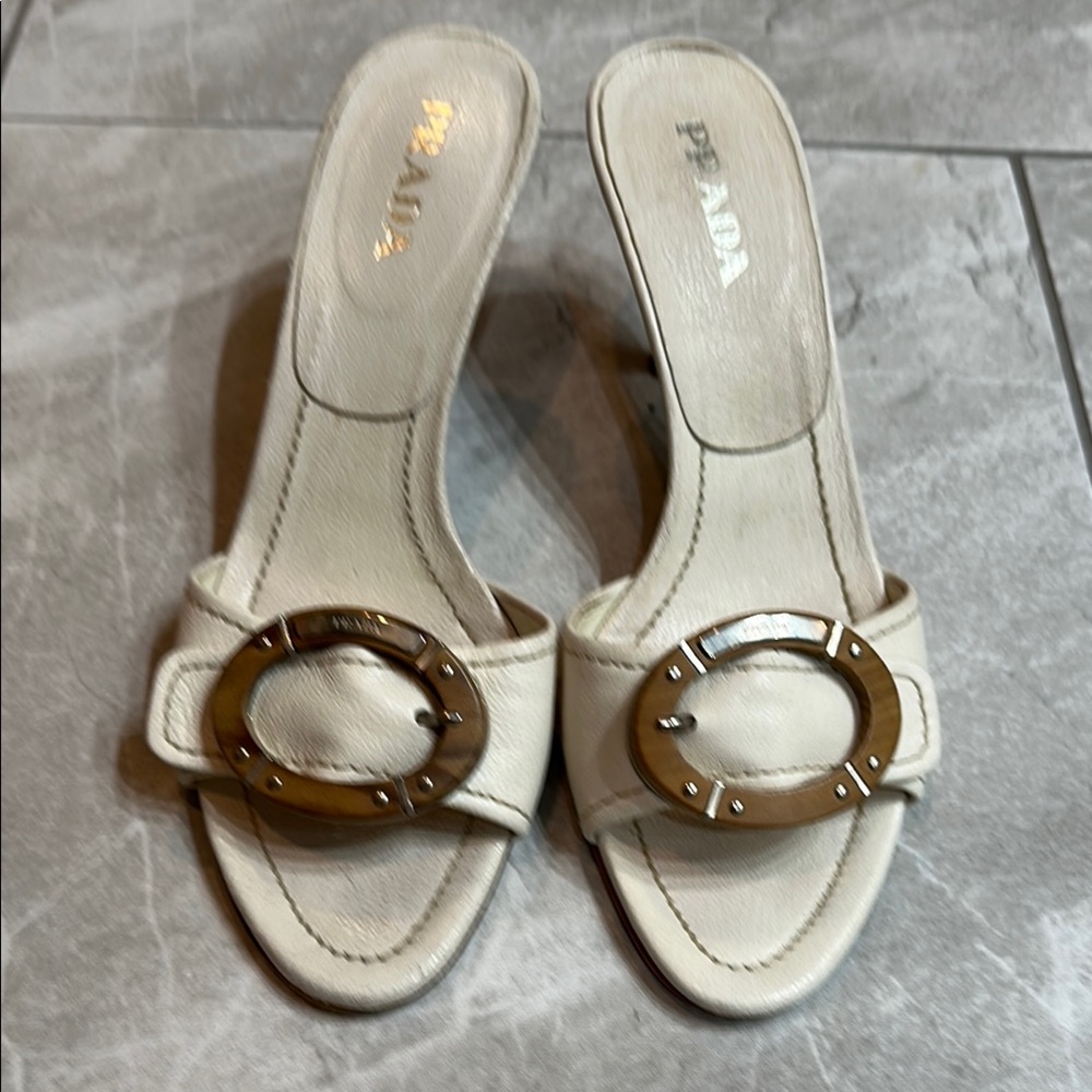 Prada Cream Mules with Decorative Buckle